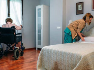 hospice aide helping patient